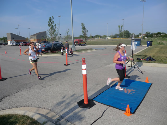 Saturday June 30, 2012 - Runners making the finish of The Great 8K!