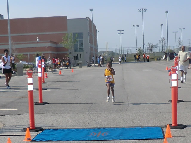 Saturday June 30, 2012 - Runners making the finish of The Great 8K!