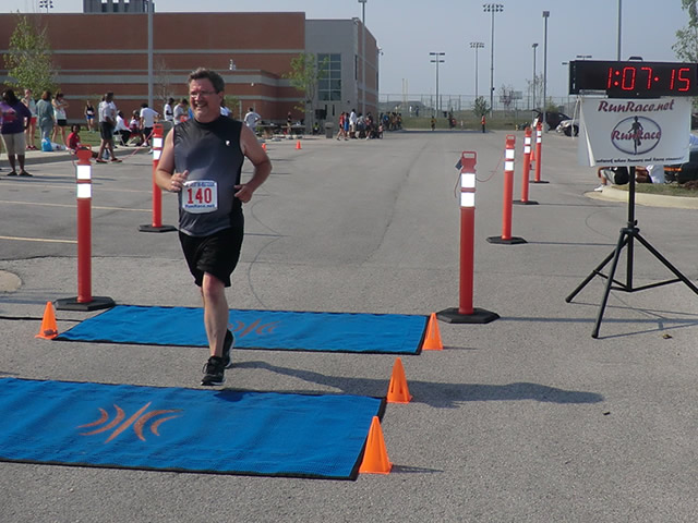 Saturday June 30, 2012 - Runners making the finish of The Great 8K!