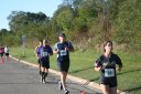 Looking strong & having fun, middle of the pack, 2..5 miles into race on University/Schwaeger Dr