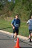 Looking strong & having fun, middle of the pack, 2..5 miles into race on University/Schwaeger Dr