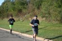Looking strong & having fun, middle of the pack, 2..5 miles into race on University/Schwaeger Dr