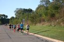 Looking strong & having fun, middle of the pack, 2..5 miles into race on University/Schwaeger Dr