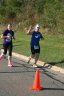 Looking strong & having fun, 2.5 miles into race on University/Schwaeger Dr