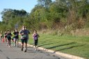 Looking strong & having fun, 2.5 miles into race on University/Schwaeger Dr
