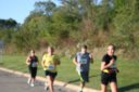 Looking strong & having fun, 2.5 miles into race on University/Schwaeger Dr