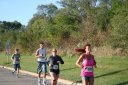 Looking strong & having fun, 2.5 miles into race on University/Schwaeger Dr