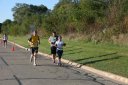 Looking strong & having fun, 2.5 miles into race on University/Schwaeger Dr