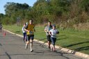 Looking strong & having fun, 2.5 miles into race on University/Schwaeger Dr