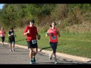 Looking strong & having fun, 2.5 miles into race on University/Schwaeger Dr