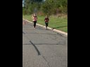 Looking strong & having fun, 2.5 miles into race on University/Schwaeger Dr