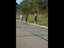 Looking strong & having fun, 2.5 miles into race on University/Schwaeger Dr