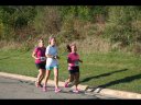 Looking strong & having fun, 2.5 miles into race on University/Schwaeger Dr