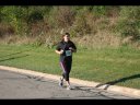 Looking strong & having fun, 2.5 miles into race on University/Schwaeger Dr